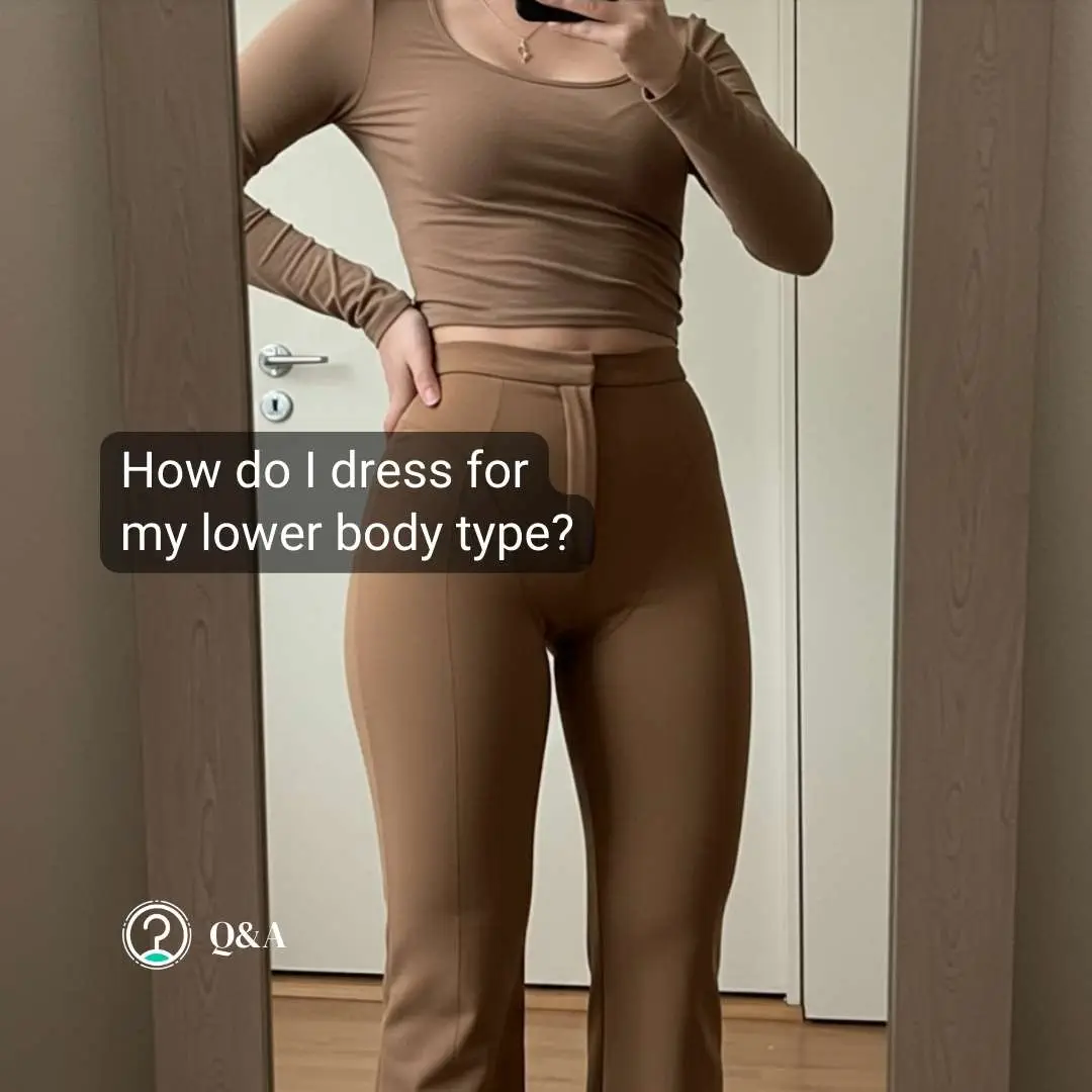 A person in a fitted brown top and pants poses thoughtfully in front of a mirror, contemplating their lower body type. Is it time for a virtual closet audit to refine their wardrobe choices?.